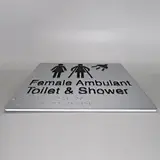 female ambulant toilet shower braille sign